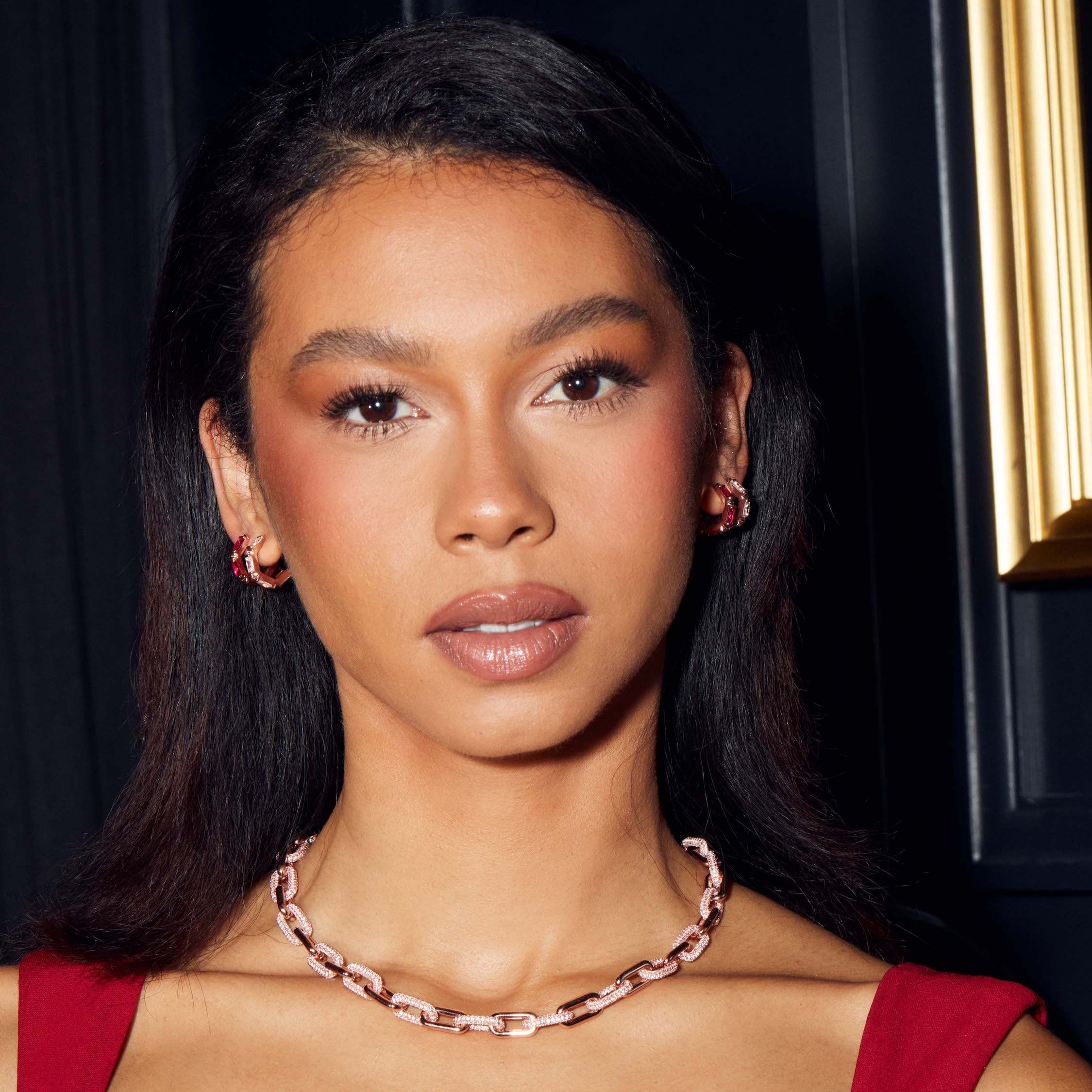 Ora Ana Claire Huggie Hoops styled close to the ear