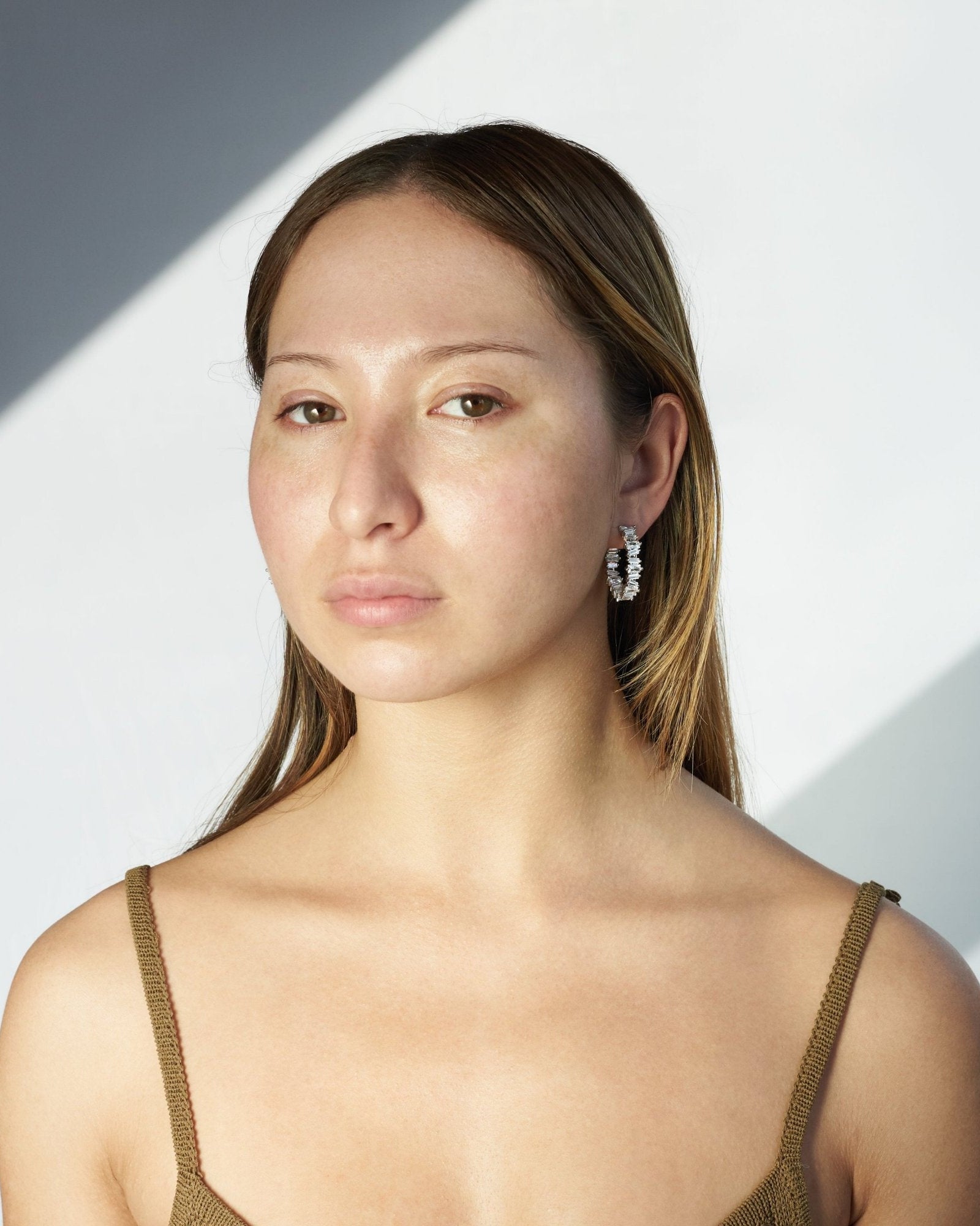 Ora Ana Clarity Hoops styled on the ear