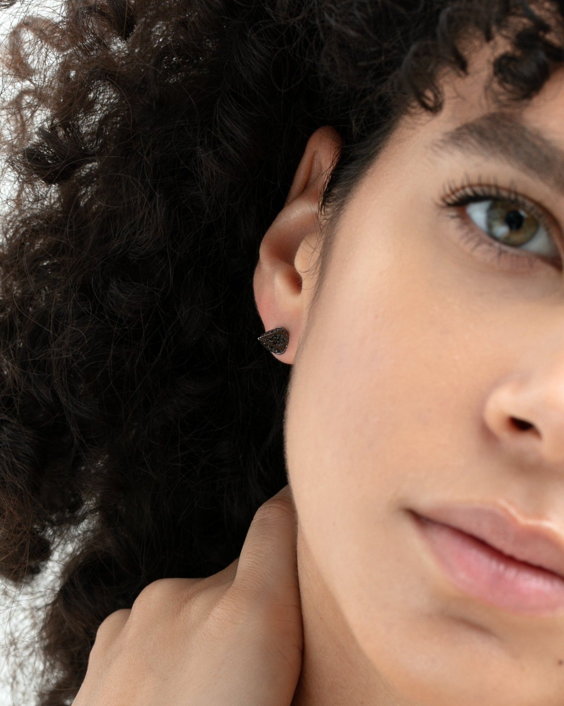 Ora Ana Dagger Studs worn with sunglasses