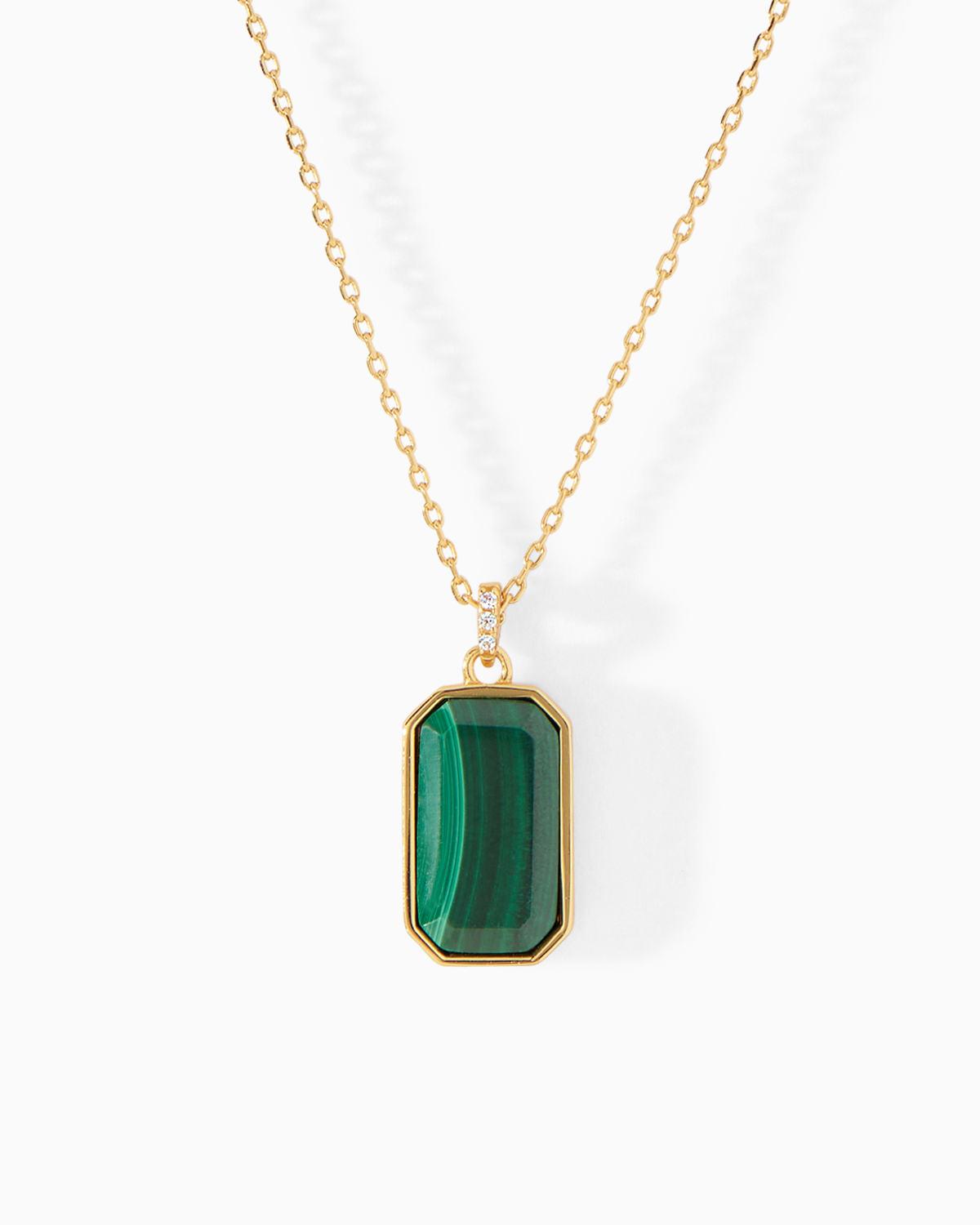 Detail of the malachite pendant on the Ora Ana Tessa Tag Necklace