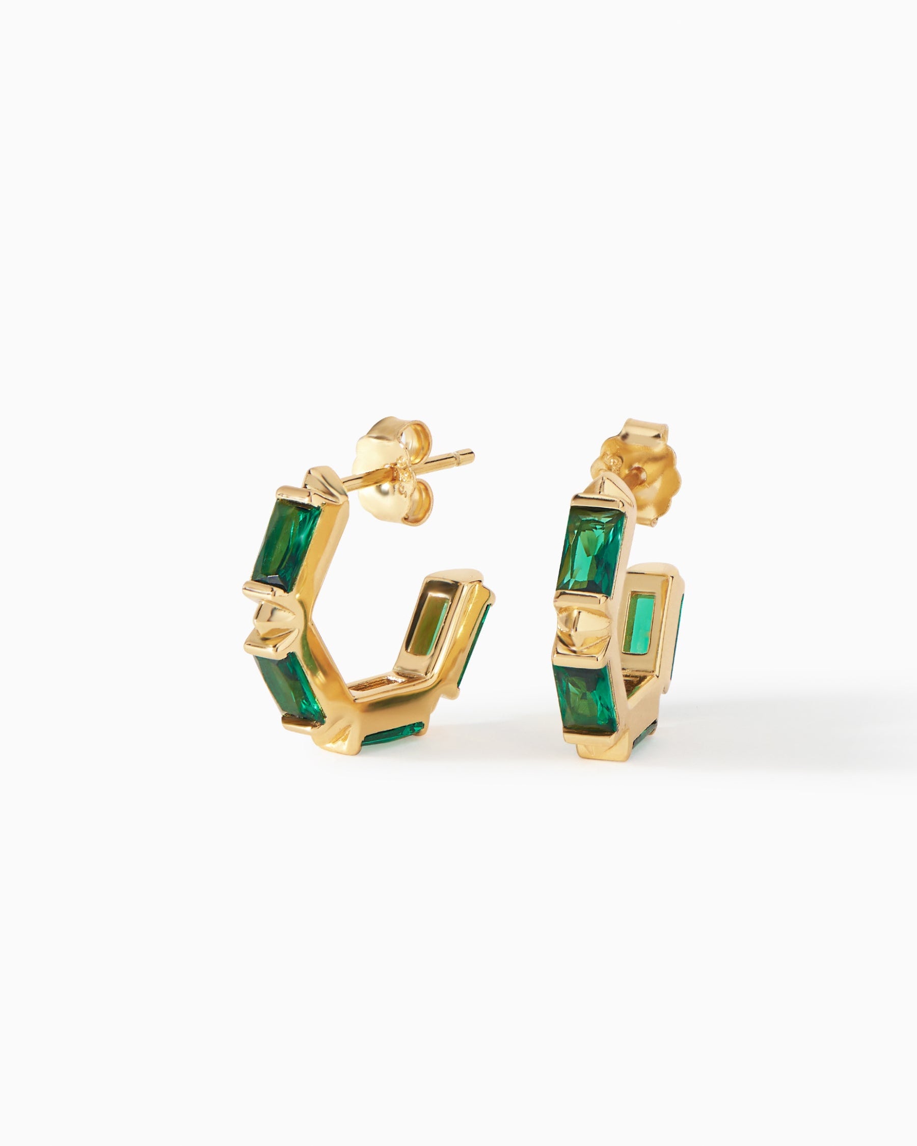Claire Huggie Hoops in gold vermeil with emerald CZ from Ora Ana