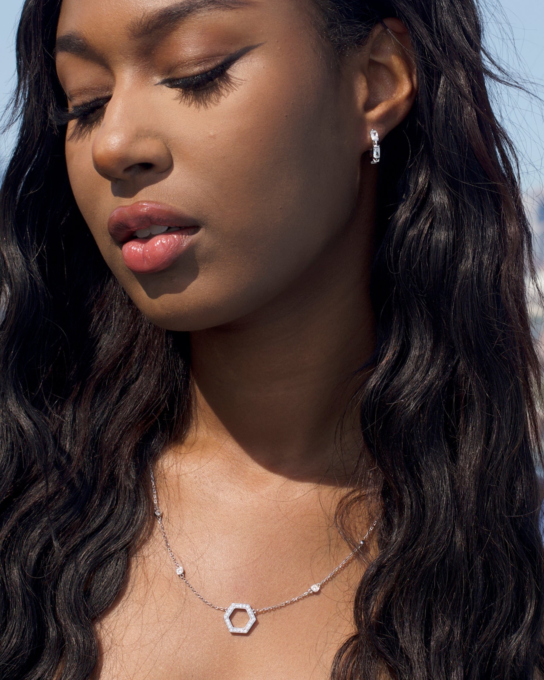Claire Huggie Hoops in sterling silver from Ora Ana