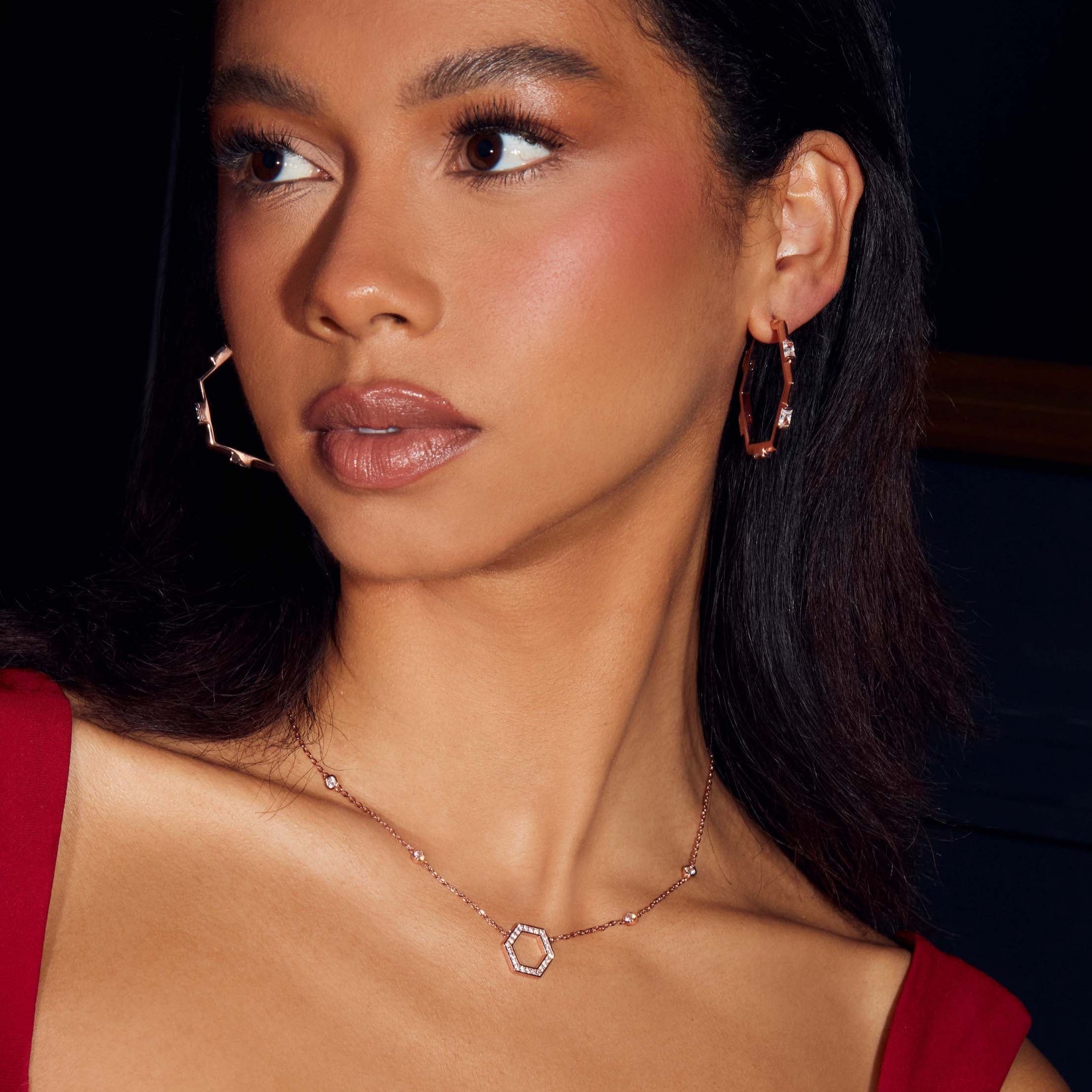 Claire Hoop Earrings medium size by Ora Ana worn on the ear