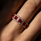 Crystalline Ring in rose gold with ruby toned stones, worn on the finger