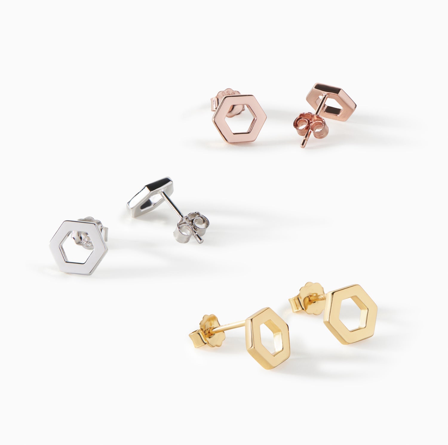 All three Ora Ana Helena Stud Earring finishes shown together