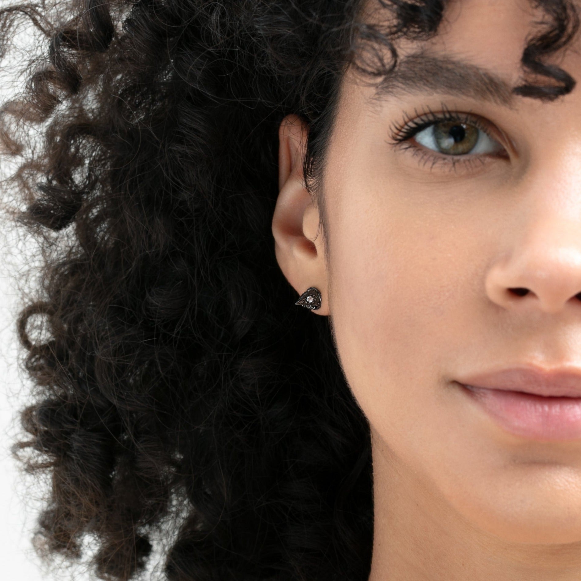 Detail of the 7mm dagger form on the Ora Ana stud earrings