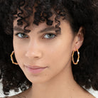Ora Ana Claire Hoops styled in an editorial portrait crop