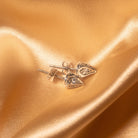 Ora Ana Dagger Stud Earrings shown close to the ear